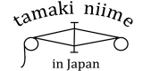 有限会社玉木新雌のロゴ